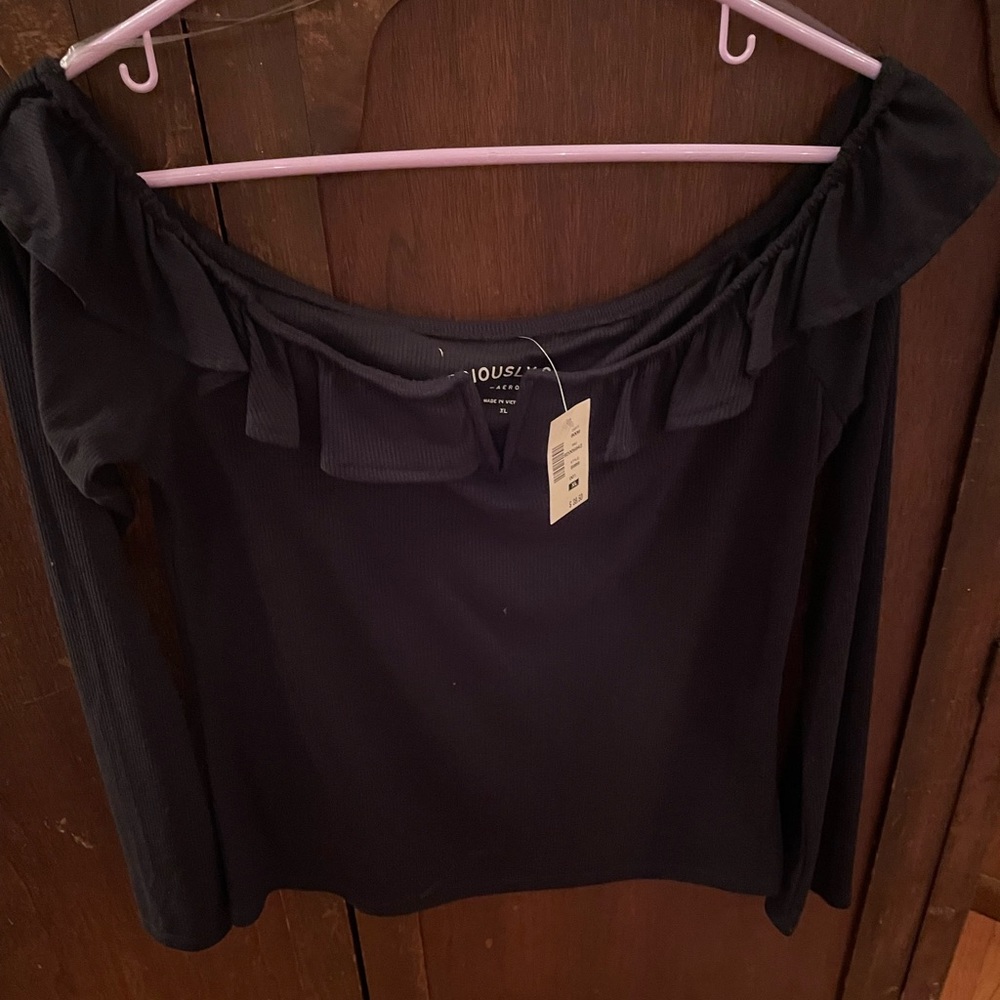 Black off the shoulder shirt